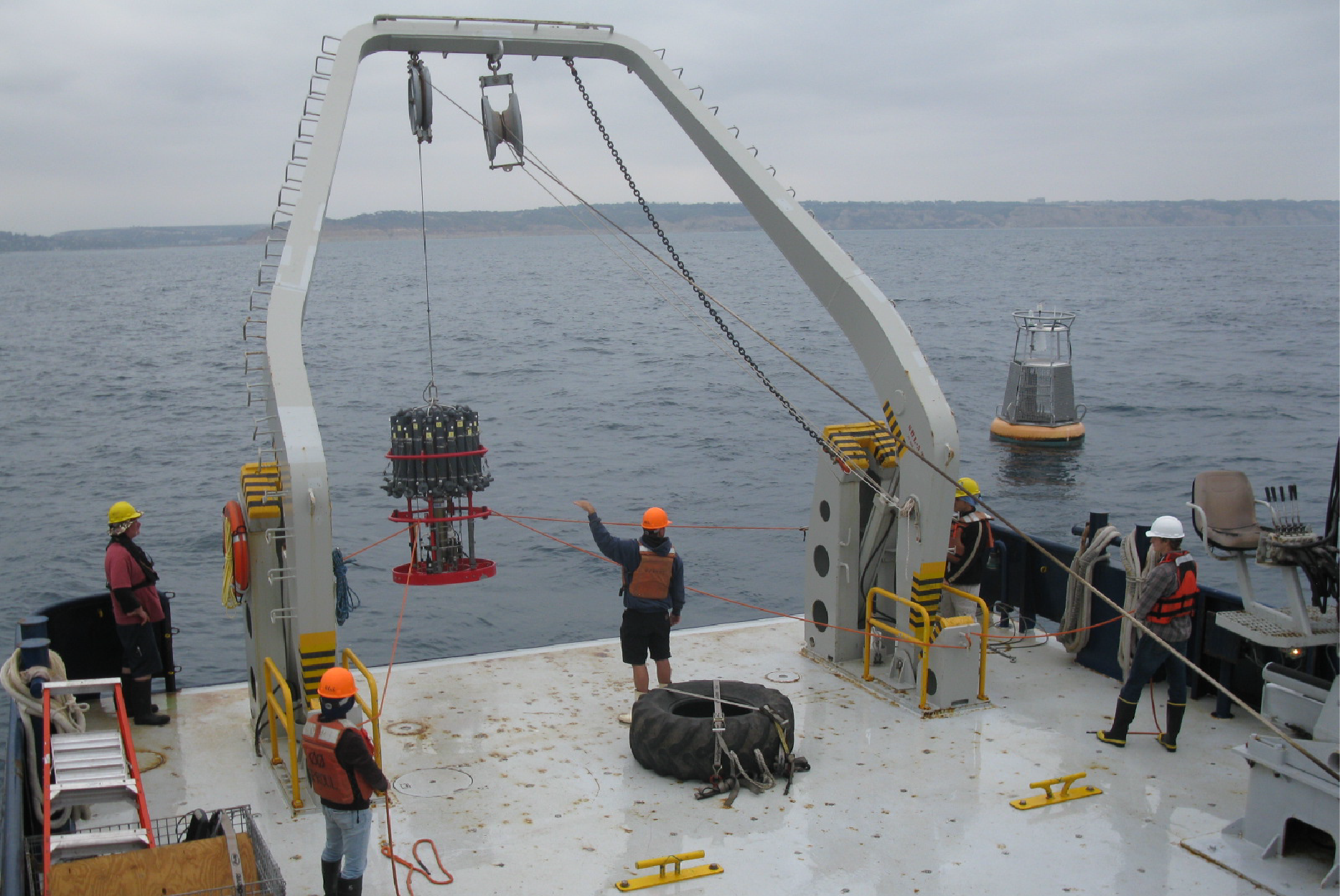 A CTD cast is performed next to the Del Mar mooring for sensor calibration and validation, 2011